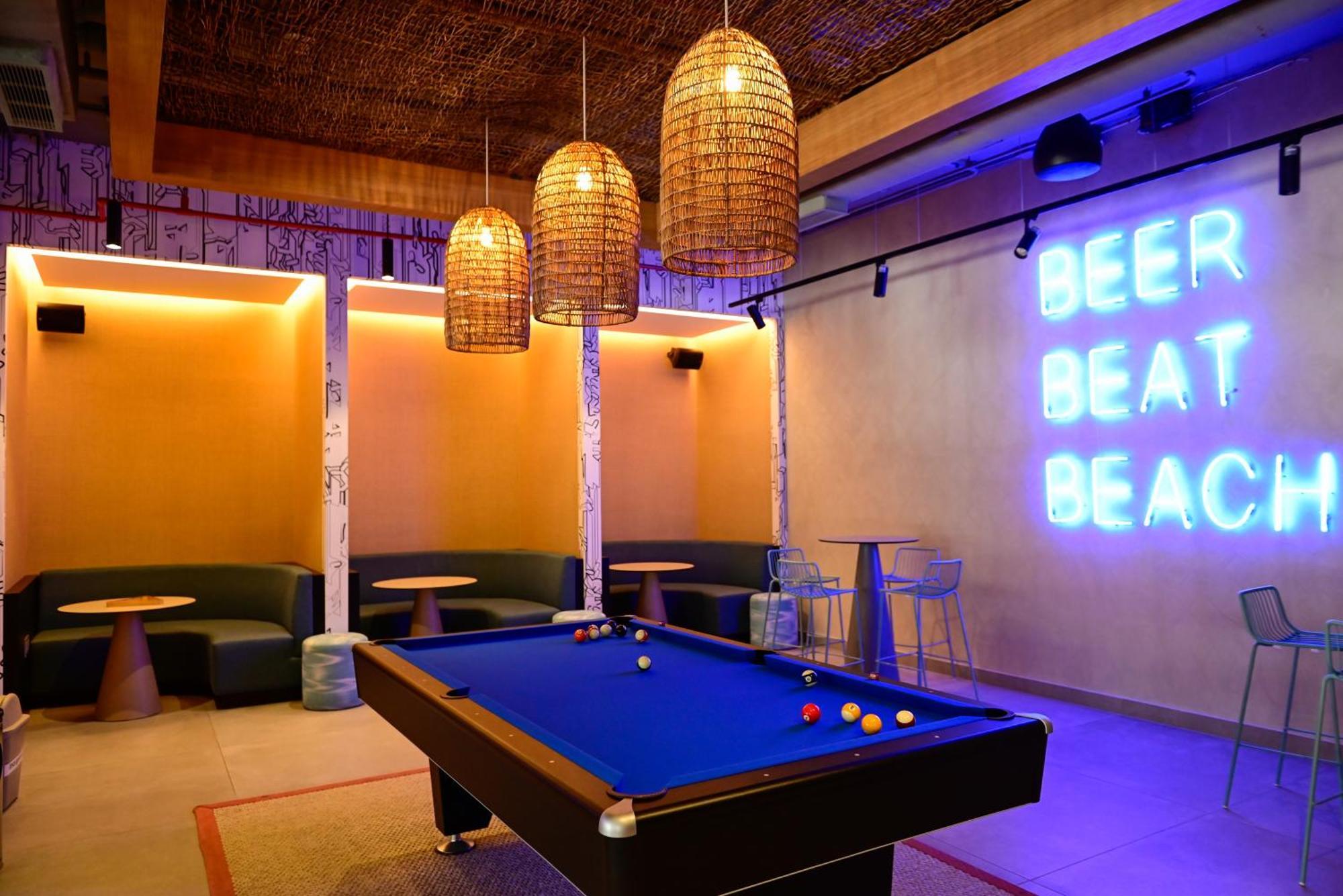 Hotel Aloft Playa Del Carmen Zewnętrze zdjęcie The interior of the bar